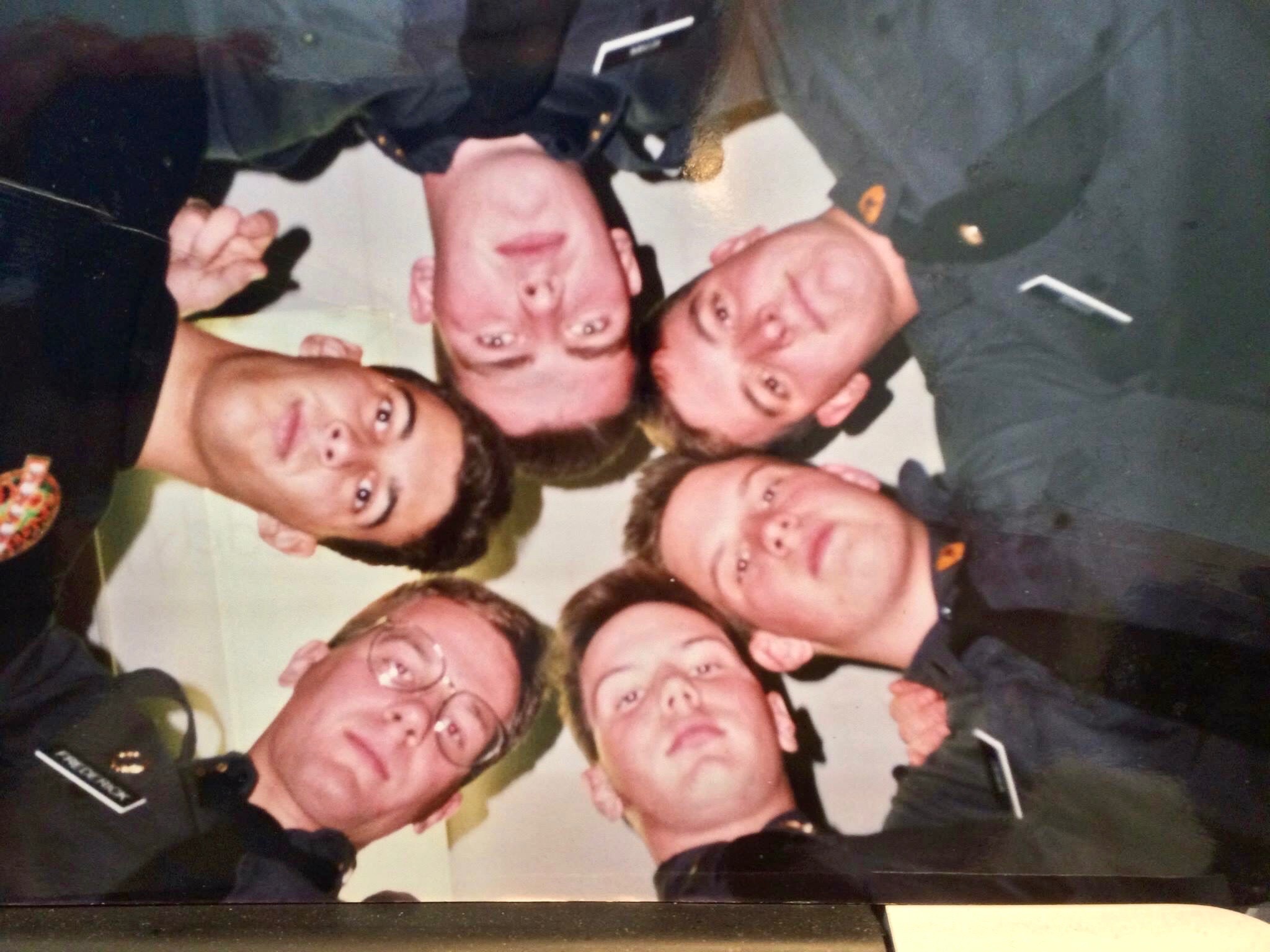 Six Pack members arranged in a circle in 1990